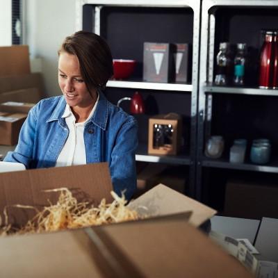 woman packing parcels